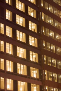 USA, New York State, New York City, Contemporary office building illuminated at night. Photo :