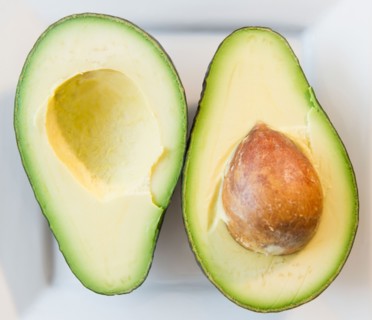 Close up of halves of avocado. Photo: Jamie Grill