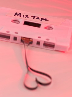 White mix tape with heart shape, studio shot. Photo : Daniel Grill
