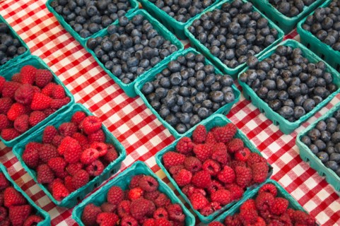 Raspberries and blueberries in cartons. Photo : Gary J Weathers