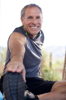 Portrait of senior stretching. Photo : db2stock