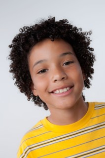 Studio portrait of boy (8-9). Photo : Rob Lewine