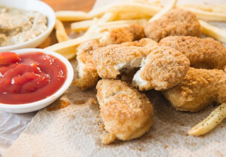 Close up of fried chicken fingers. Photo : Jamie Grill
