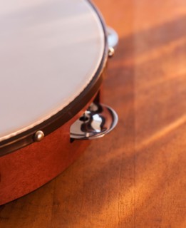 Close-up of tambourine. Photo : Daniel Grill