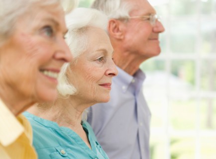 Profiles of senior women and senior man.