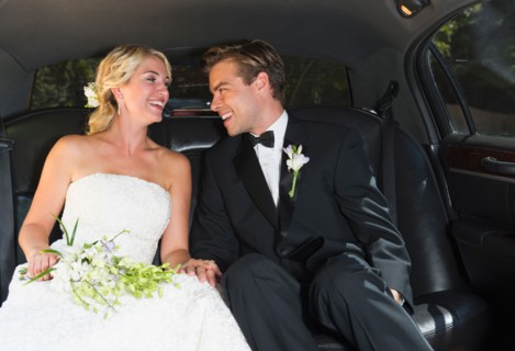 Married couple in limousine.