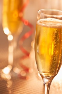 Flutes with champagne, close-up. Photo: Daniel Grill