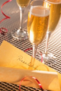 Flutes with champagne and list of resolutions. Photo: Daniel Grill
