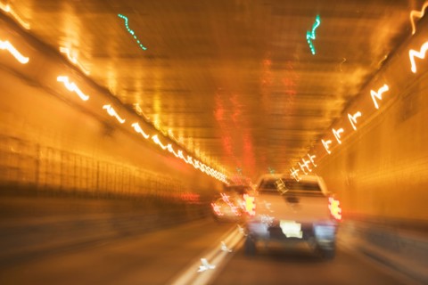 USA, New York State, New York City, Manhattan, Cars in tunnel, blurred motion. Photo: fotog