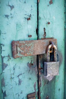 Old rusty padlock on door. Photo: Winslow Productions
