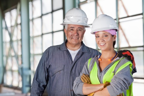 Portrait of male and female manual workers. Photo : db2stock