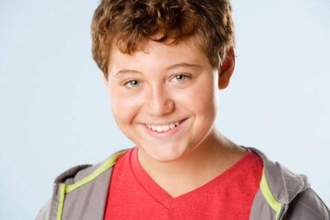Studio portrait of boy (12-13). Photo : Rob Lewine