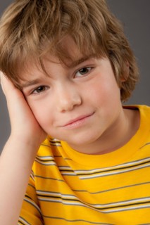 Studio portrait of boy (8-9). Photo : Rob Lewine