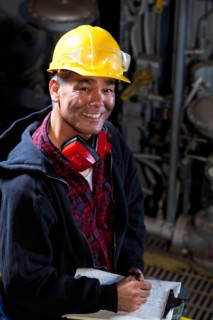 Portrait of male manual worker wearing hardhat. Photo : db2stock
