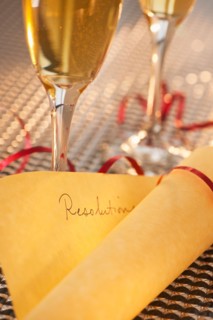 Flutes with champagne and list of resolutions. Photo: Daniel Grill