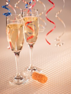 Flutes with champagne, close-up. Photo: Daniel Grill