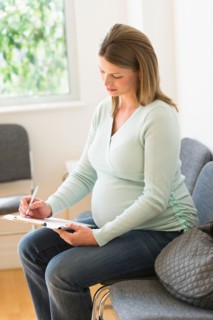 Young woman in doctor's waiting room.