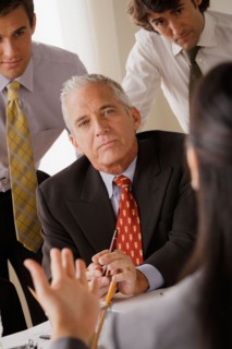 Businessmen at business meeting. Photo : Rob Lewine