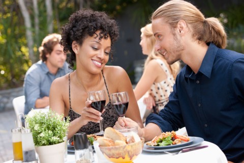 Couple dining in outdoor restaurant. Photo : Rob Lewine