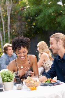 Couple dining in outdoor restaurant. Photo : Rob Lewine