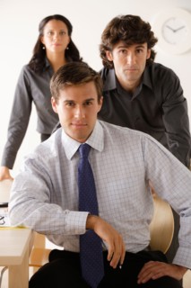 Portrait of business people in office. Photo : Rob Lewine