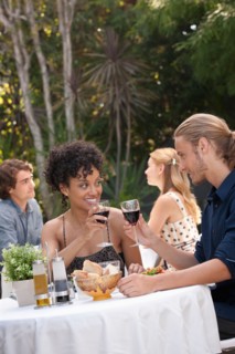 Couple dining in outdoor restaurant. Photo : Rob Lewine