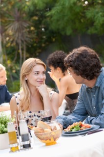 Couple dining in outdoor restaurant. Photo : Rob Lewine