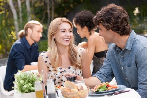 Couple dining in outdoor restaurant. Photo : Rob Lewine