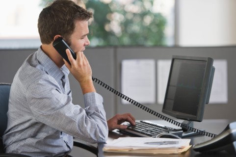 Young man working in office.