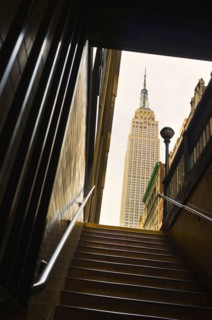 Empire State Building as seen from subway station staircase.