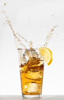 Studio shot of iced tea with splash.