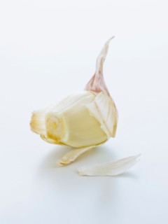 Studio shot of fresh garlic clove.