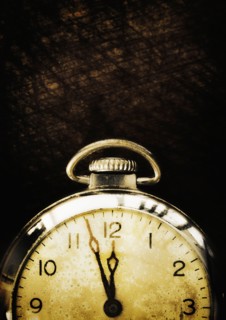 Old-fashioned pocket watch, studio shot.