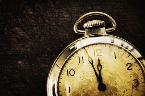 Old-fashioned pocket watch, studio shot.