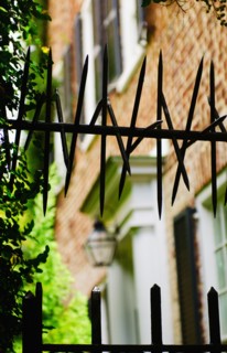 USA, South Carolina, Charleston, Close up of iron spikes on fence.