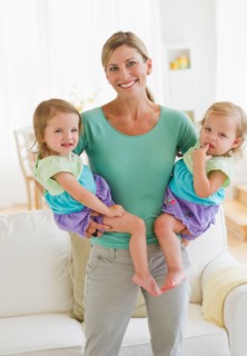 Portrait of mother with daughters (2-3).