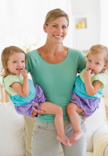 Portrait of mother with daughters (2-3).