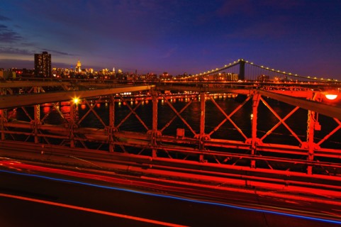 USA, New York State, New York City, Midtown Manhattan and Brooklyn Bridge at dusk.