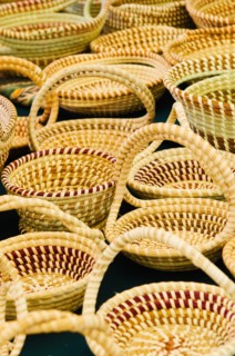 USA, South Carolina, Charleston, Close up of sweetgrass baskets on street market.