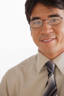 Portrait of business man smiling. Photo: Rob Lewine