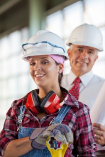 Portrait of manual worker and manager. Photo : db2stock