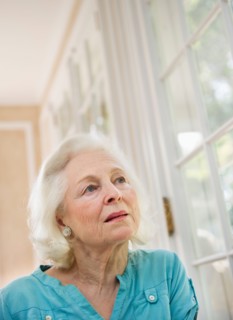 Portrait of pensive senior woman.