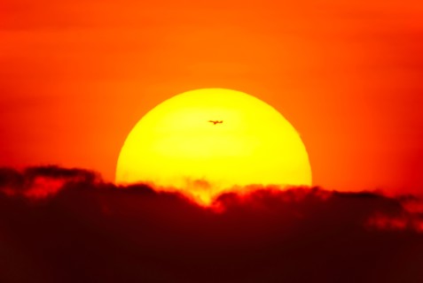 Large sun at sunset.