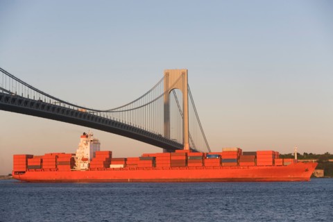 USA, New York State, New York City, Brooklyn, Container Ship under Verrazano-Narrows Bridge. Photo