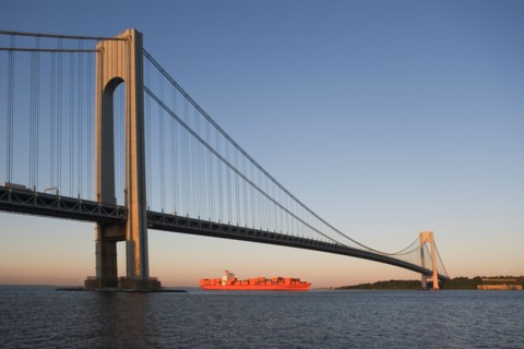 USA, New York State, New York City, Brooklyn, Container Ship under Verrazano-Narrows Bridge. Photo