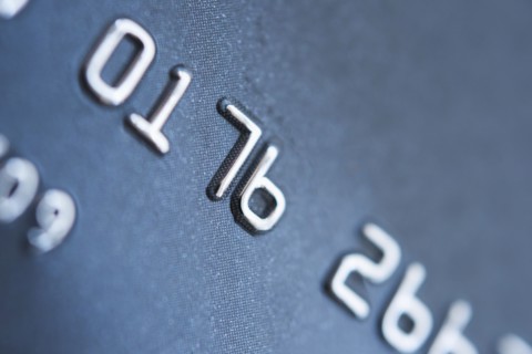 Detail of credit card, studio shot.