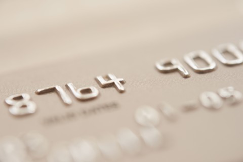 Detail of credit card, studio shot.
