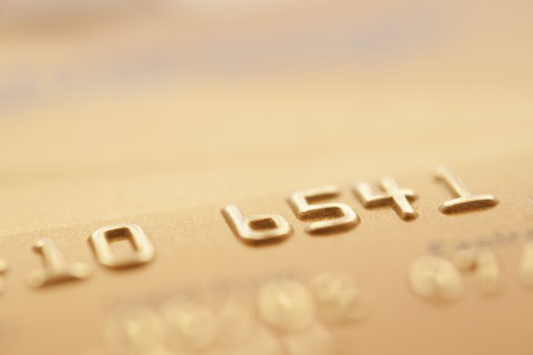 Detail of credit card, studio shot.
