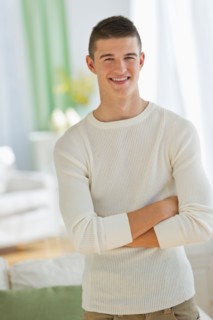 Portrait of teen (16-17) boy at home.
