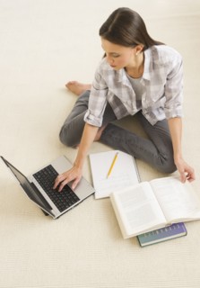 Woman studying at home.